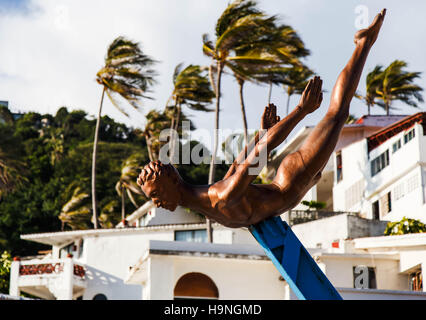 Statue at La Quebrada in Acapulco, Mexico Stock Photo