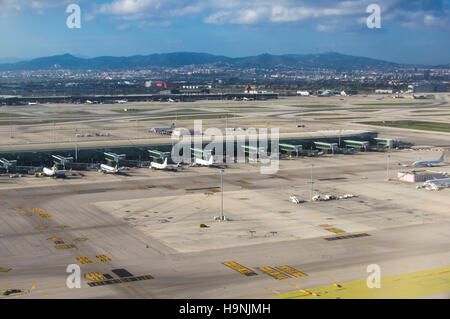 Aerial photography of Barcelona El Prat international airport with terminal T1 in the foreground. Stock Photo