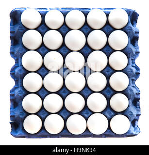 White eggs in blue basket Stock Photo
