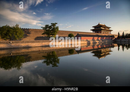 The Gate of Divine Prowess reflected in the Palace Moat (Tongzi He) that surrounds the Forbidden City in Beijing Stock Photo