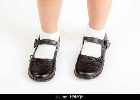 white girl's shoes and blue socks low section Stock Photo - Alamy