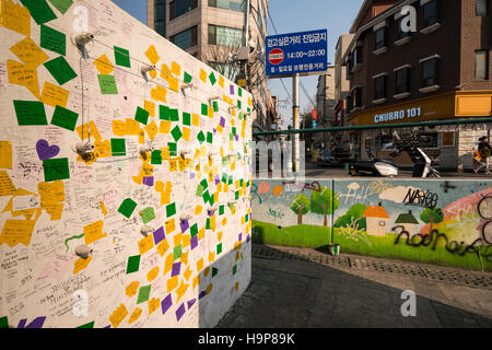 Graffiti art on purpose made wall in Hongdae Area (area near Hongik University), Seoul, Korea Stock Photo