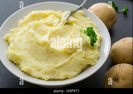 A bowl homemade mashed potato. Potatoes, double cream, butter and salt. Stock Photo