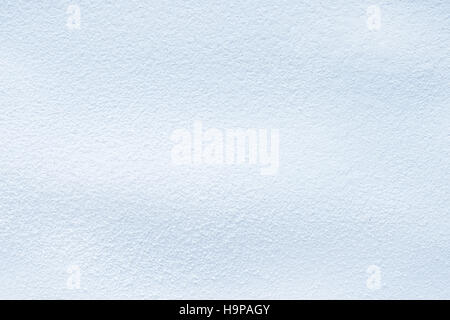 Clear white snow field surface close-up for texture or background Stock Photo