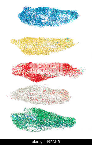 Colored glitters brush strokes set. On white background Stock Photo