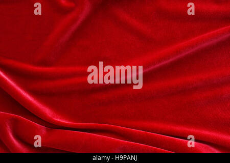 Red silk velvet cloth texture and background Stock Photo