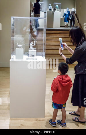 New York City,NY NYC,Manhattan,Upper East Side,Fifth Avenue,Metropolitan Museum of Art,Met,glass case,figurine,Asian Asians ethnic immigrant immigrant Stock Photo