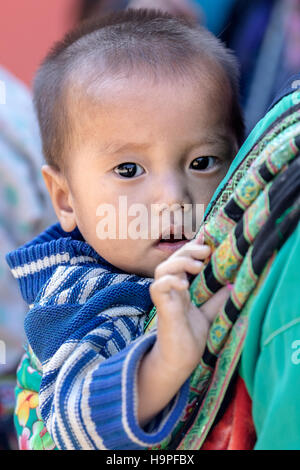 ethnic Black Hmong boy in the tribal village Lao Chai in Sapa, Vietnam, Asia Stock Photo