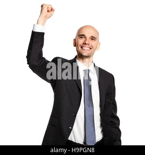 Studio shot of happy young businessman celebrating his success. Stock Photo