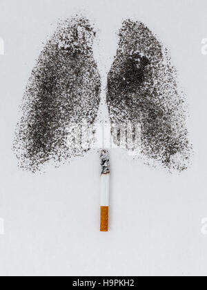 Shape of lungs with charcoal powder and cigarette on white backg Stock Photo