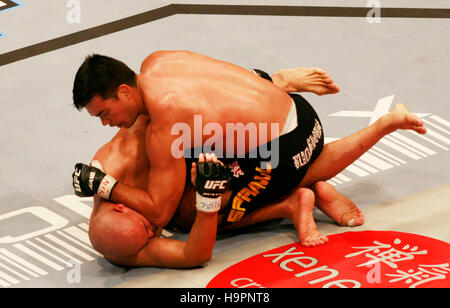 Lyoto Machida, top, fights Sam Hoger at the Ultimate Fighting Champion Championship UFC 67 at the Mandalay Bay Hotel in Las Vegas on Feb. 3, 2007. Photo credit: Francis Specker Stock Photo