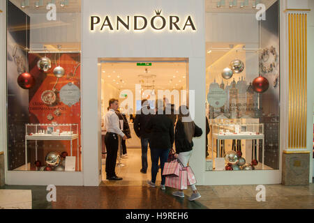 Pandora Fashion jewellers in the INTU Trafford Centre  Manchester. UK November, 2016. Black Friday Sales Weekend.  City centre holiday shopping season, retail shops, stores, Christmas shoppers, people discount sale shopping, and consumer spending on Black Friday weekend considered to be the biggest shopping event of the year.   U.K. retailers have embraced the U.S. post-holiday sale bonanza, even though many customers were left surprised by wall-to-wall discounts in their favourite stores as some went bonkers for bargains Stock Photo