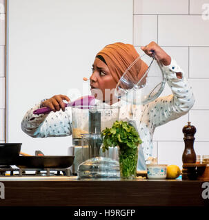 Birmingham, UK. 25th November, 2016. Nadiya Hussain, winner of The Great British Bake Off 2015 and author of several cookery books entertains the crowds at the BBC Good Food Show. Photo Bailey-Cooper Photography/Alamy Live News Stock Photo