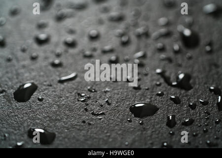 slate surface with water drops macro shot Stock Photo