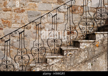 Wrought iron banisters on the steps at Avebury Manor, Wiltshire. Stock Photo