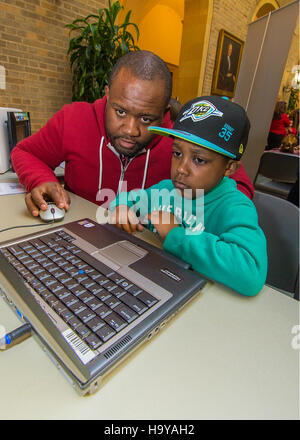 This image from the USDA showcases the 'Take Our Sons and Daughters to Work Day' event at the Jamie Whitten Building in Washington, D.C. The photo captures a moment of interaction between USDA employees and their children, highlighting the importance of engaging youth in professional settings. Stock Photo
