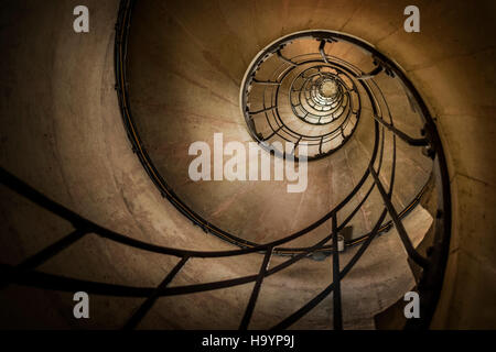 Looking up one of the spiral stairs of the Arc de Triomphe, Paris Stock Photo