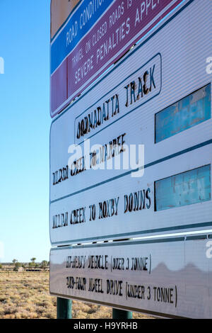 Extreme heat causes lettering to peel off of a road sign on the Oodnadatta Track at William Creek Outback South Australia. Stock Photo