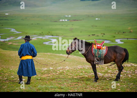 Mongolia, Arkhangai province, yurt nomad camp in the steppe, Mongolian horserider Stock Photo