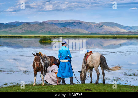 Mongolia, Bayankhongor province, Naadam, traditional festival, young nomad near a lake Stock Photo