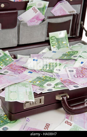 Briefcase full of Euro banknotes Stock Photo