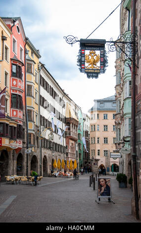 INNSBRUCK, AUSTRIA – FEBRUARY 28, 2016: Old town, restaurants and famous Golden Roof (Goldenes Dachl) in Innsbruck, Tirol, Austria Stock Photo