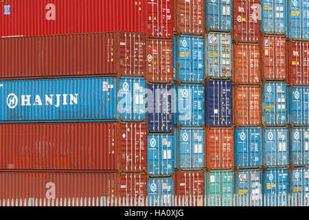 Front View Stack Containers End on view of a stack of shipping containers stacked in a yard in ...