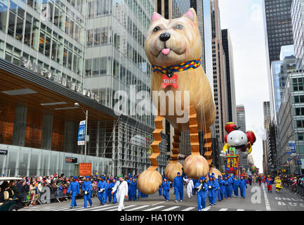 Trixie the Bouncing Dog making his debut this year at the parade. Stock Photo