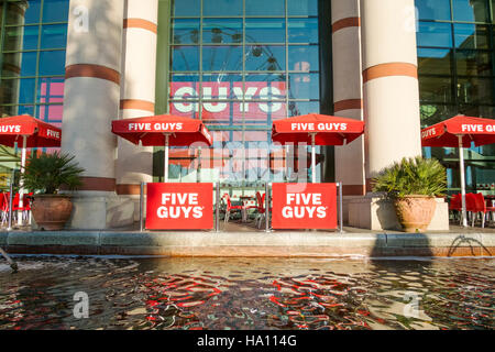 Five Guys Enterprises LLC is an American fast casual restaurant chain focused on hamburgers, hot dogs, and French fries. Stock Photo