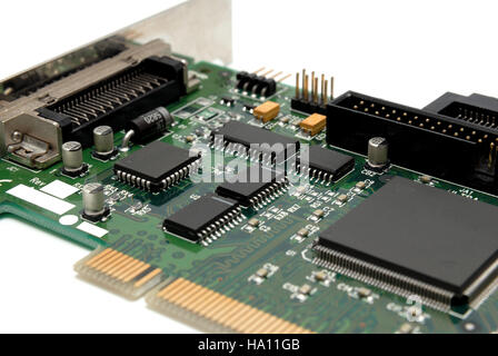The printed-circuit-board with computer chips resistors and condensers Stock Photo
