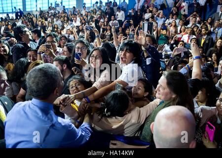 U.S. President Barack Obama greets audience members after the Young Leaders of Americas Initiative town hall meeting at the Pontifical Catholic University of Peru November 19, 2016 in Lima, Peru. Stock Photo