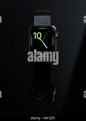 Shiny steel Apple Watch stylish smartwatch with analog clock dial on display isolated on black background Stock Photo