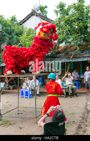 Unicorn Dance, Chinese Dragon,  My An Hung, Farming village, Mekong River, Vietnam, Asia Stock Photo