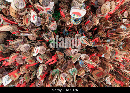 Lijiang, China - November 10, 2016: Close up of hand written prayers hanging on a roof. Stock Photo