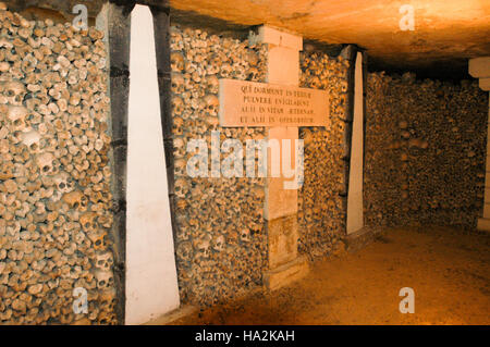 Paris, France - 17 December 2002: The Catacombs of Paris, France. They are underground estuaries and tourist attractions. Stock Photo