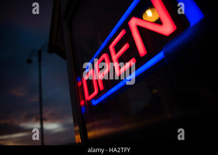 Store Window Neon Neon Open sign illuminated in a window of a store Stock Photo - Alamy