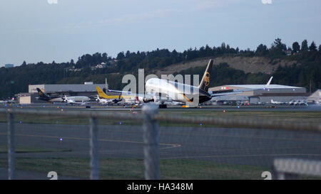 SEATTLE, WASHINGTON, USA - OCTOBER 2nd, 2014: Boeing 767-300 freight airplane landing at the airport Stock Photo