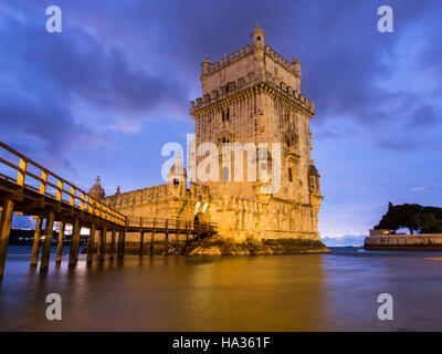 Torre de Belem on the bank of Tagus river in Lisbon, Portugal, at night.