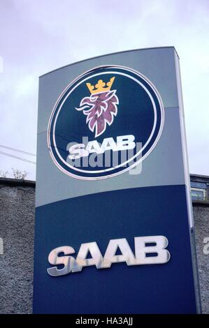 Sign with logo for a SAAB used car dealership in Dublin. The Swedish automaker went bankrupt in 2012. Stock Photo