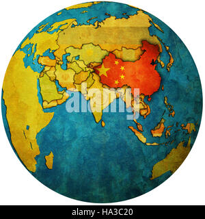 isolated over white territory of china with flag on globe map Stock Photo