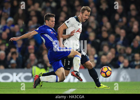 Chelsea's Cesar Azpilicueta (left) and Tottenham Hotspur's Harry Kane (right) battle for the ball during the Premier League match at Stamford Bridge, London. PRESS ASSOCIATION Photo. Picture date: Saturday November 26, 2016. See PA story SOCCER Chelsea. Photo credit should read: Adam Davy/PA Wire. RESTRICTIONS: No use with unauthorised audio, video, data, fixture lists, club/league logos or 'live' services. Online in-match use limited to 75 images, no video emulation. No use in betting, games or single club/league/player publications. Stock Photo