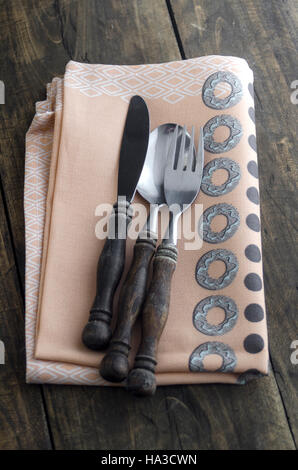 Close up of  Spoon, Fork and Knife  on  Napkin Stock Photo