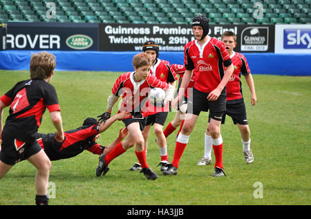 teenage boys playing rugby Stock Photo