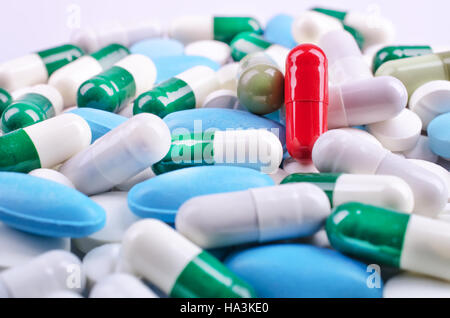 Medical theme. Plenty of colorful pills and capsules. Closeup Stock Photo