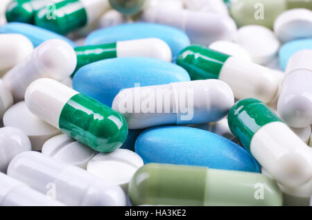 Medical theme. Plenty of colorful pills and capsules. Closeup Stock Photo