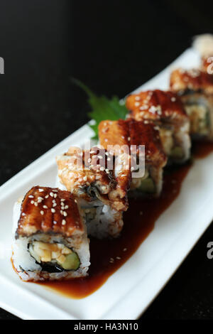 Fresh Cold Eel Sushi With Sesame Seeds Stock Photo - Alamy