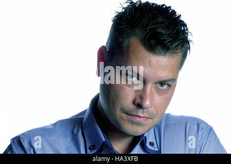 Young agry man isolated on white background Stock Photo