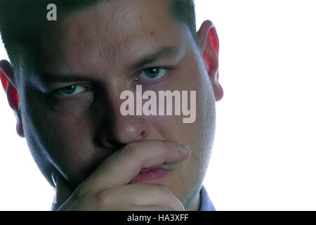 Young agry man isolated on white background Stock Photo