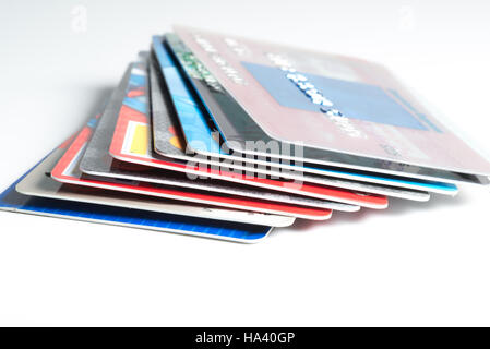 Stack of credit cards with MasterCard,American express and Visa logos on white background(for editorial use only) Stock Photo