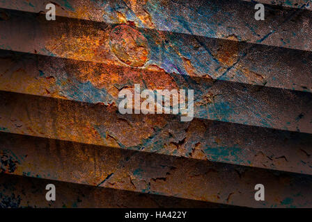 abstract background texture of old rusty corrugated metal stamped with the number 8 Stock Photo